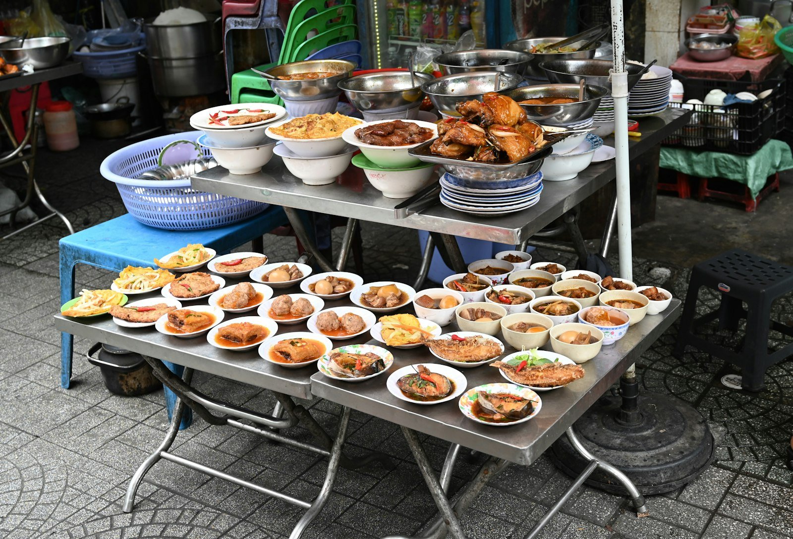 A street food stall with many dishes