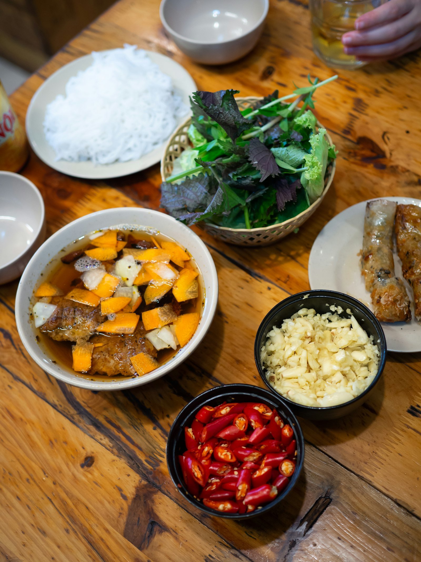 A Vietnamese noodle dish with fresh herbs